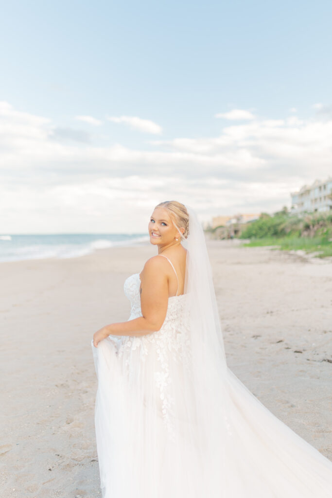bride running on the beach