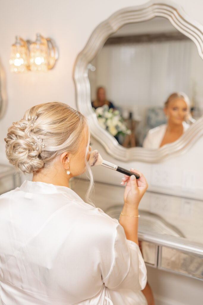 bride getting ready at harbour house oceanfront venue
