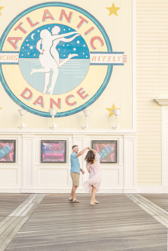 couple dancing at disneys boardwalk resort