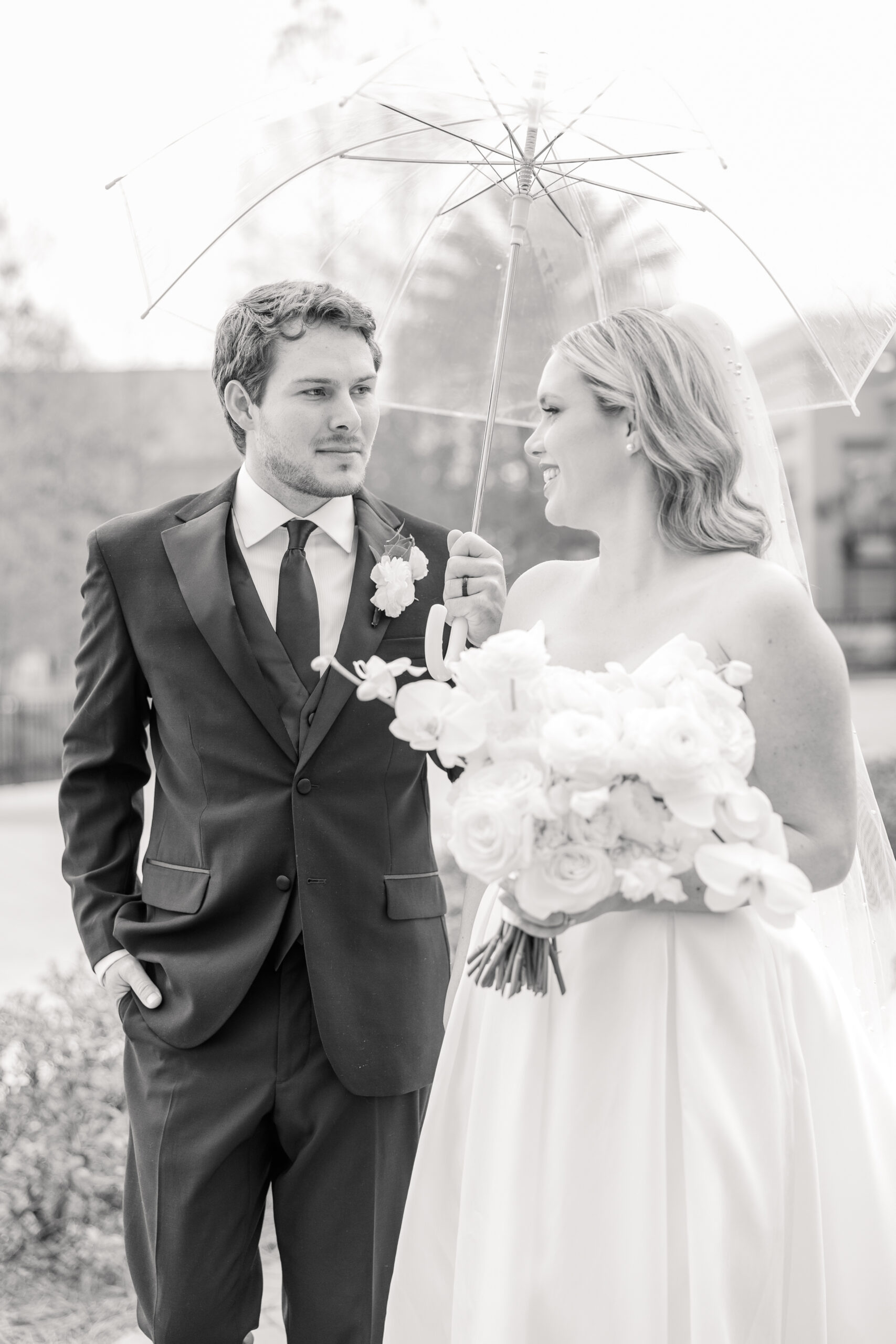 bride and groom outside in black and white