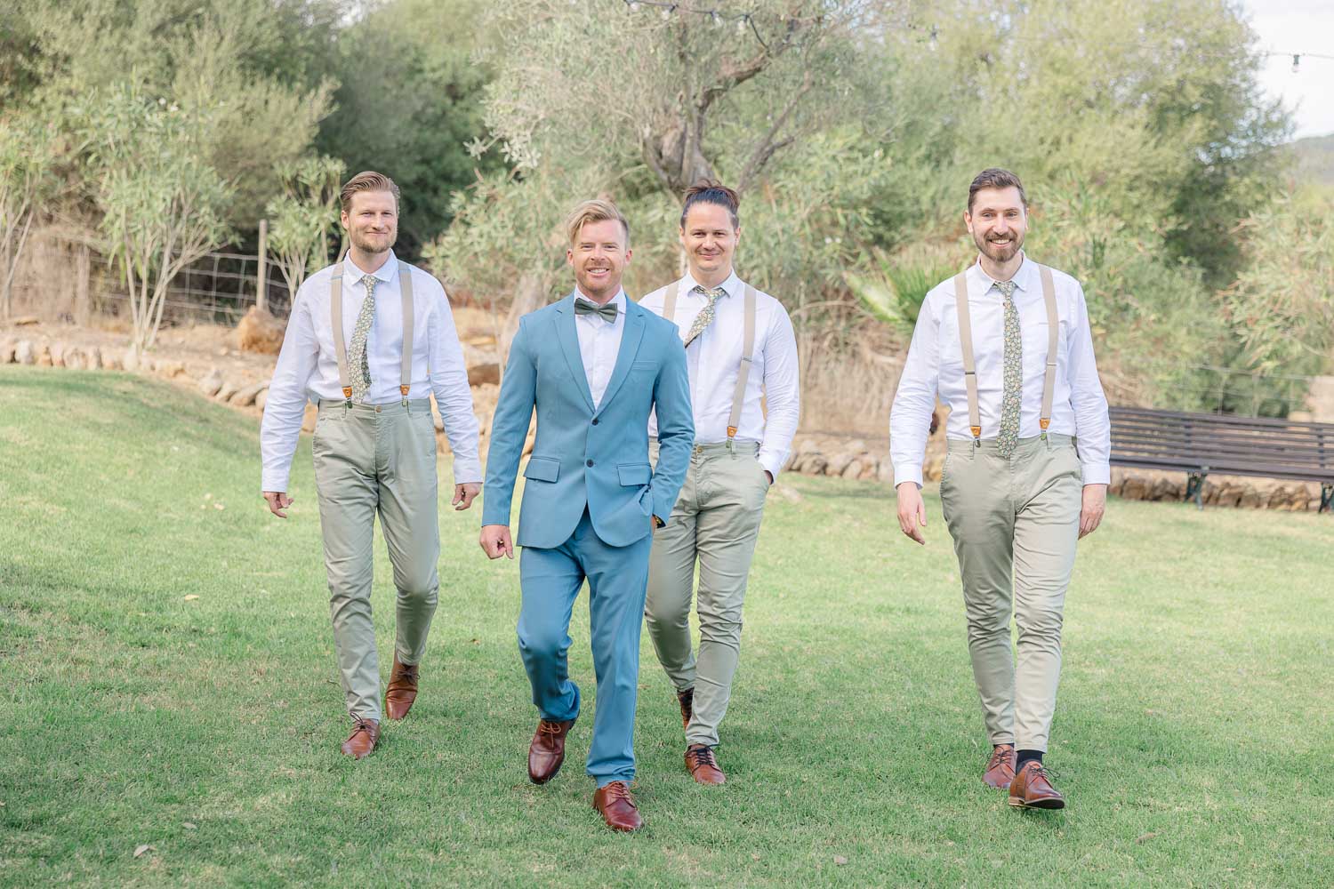 groom and groomsmen portaits walking