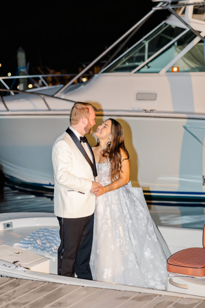 Bride and groom boat exit at Florida wedding lagoon