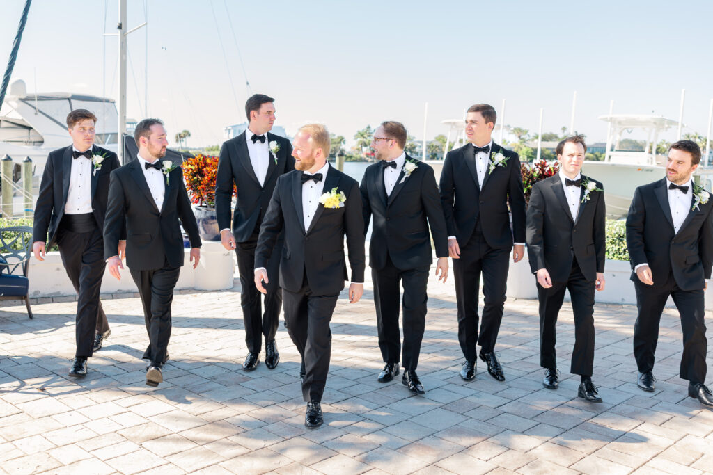 Groom getting ready with groomsmen at Eau Gallie Yacht Club Florida