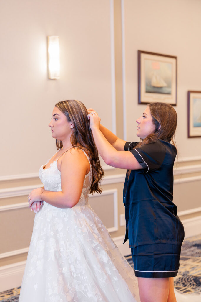 Bride getting ready with bridesmaids at Florida wedding yacht club