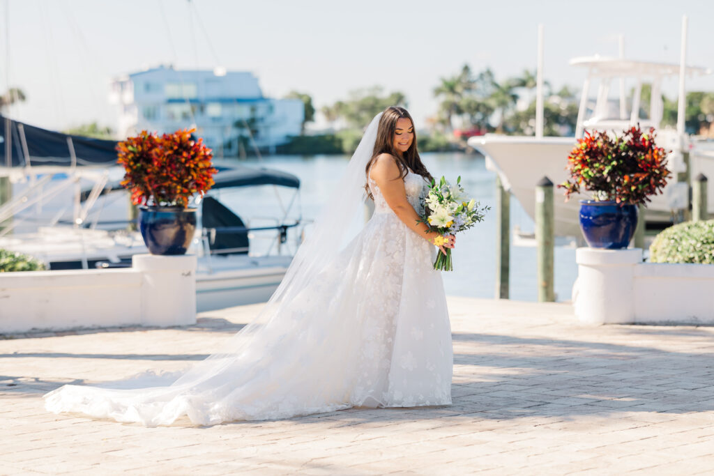 Bridal portraits at Eau Gallie Yacht Club waterfront Florida wedding