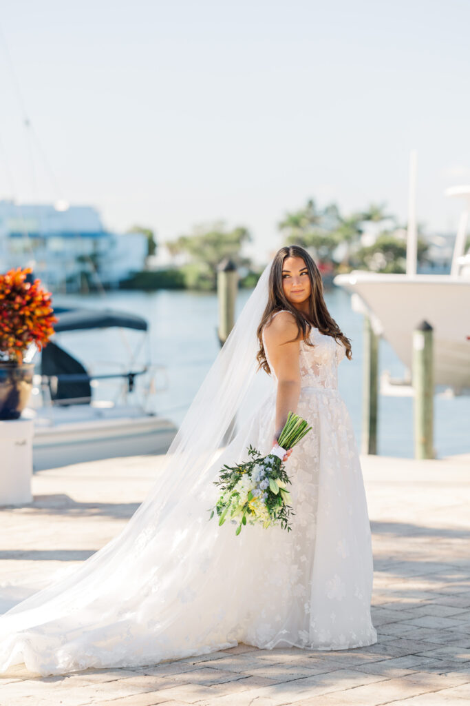 Bridal portraits at Eau Gallie Yacht Club waterfront Florida wedding