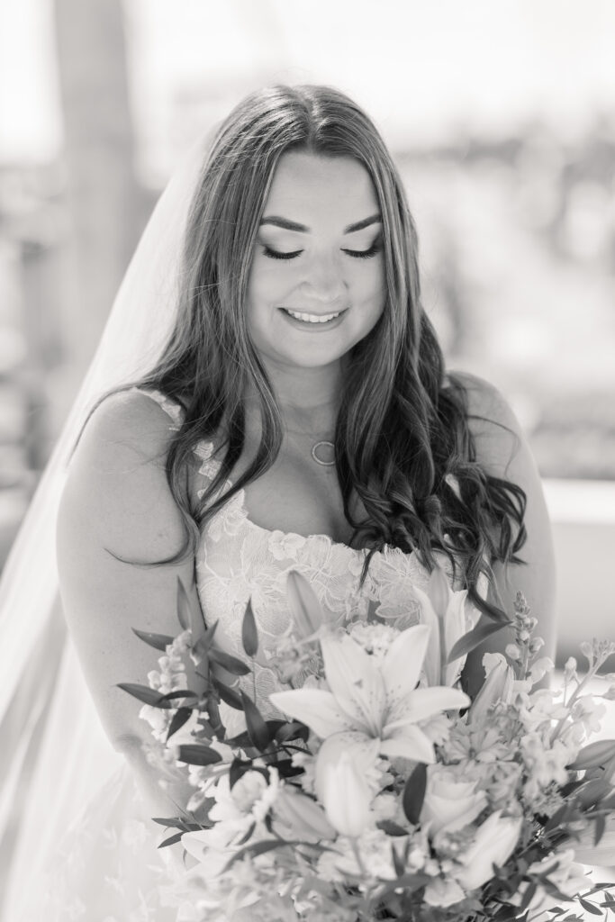 Bridal portraits at Eau Gallie Yacht Club waterfront Florida wedding