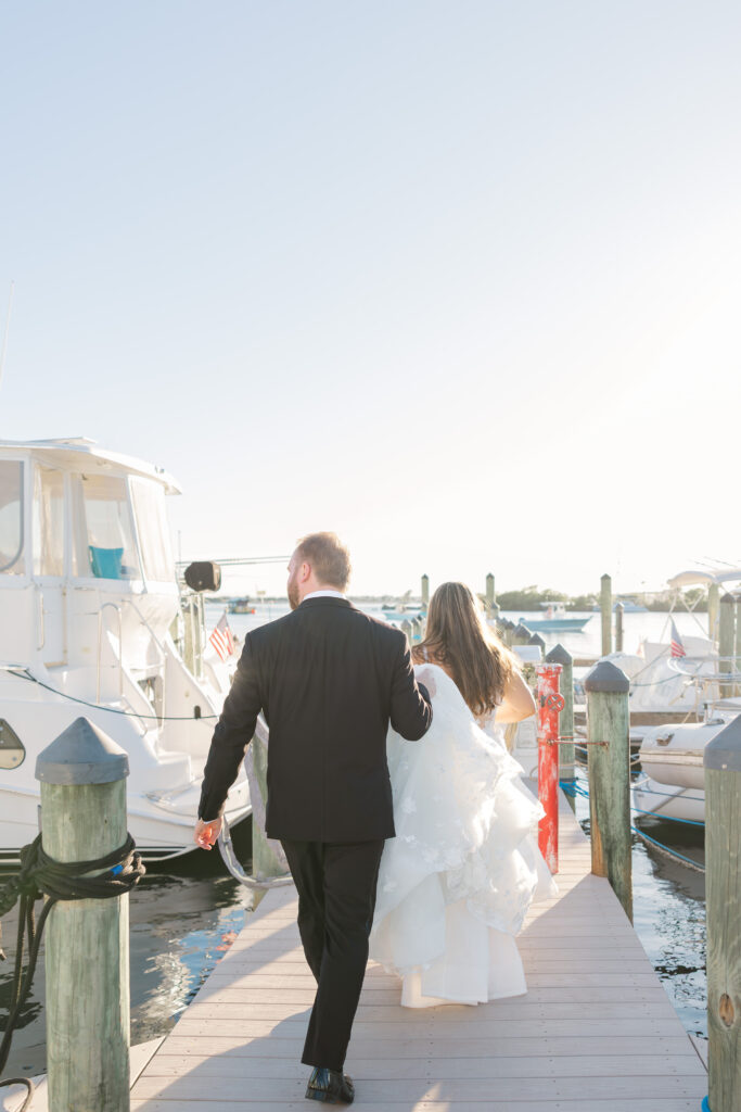 Bridal portraits at Eau Gallie Yacht Club waterfront Florida wedding