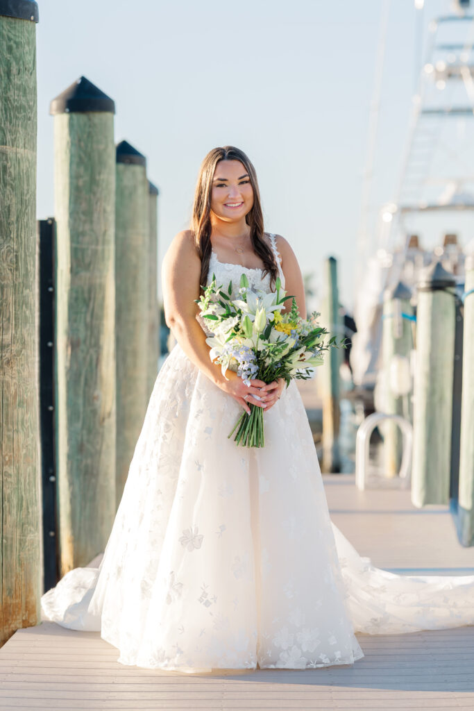 Bridal portraits at Eau Gallie Yacht Club waterfront Florida wedding