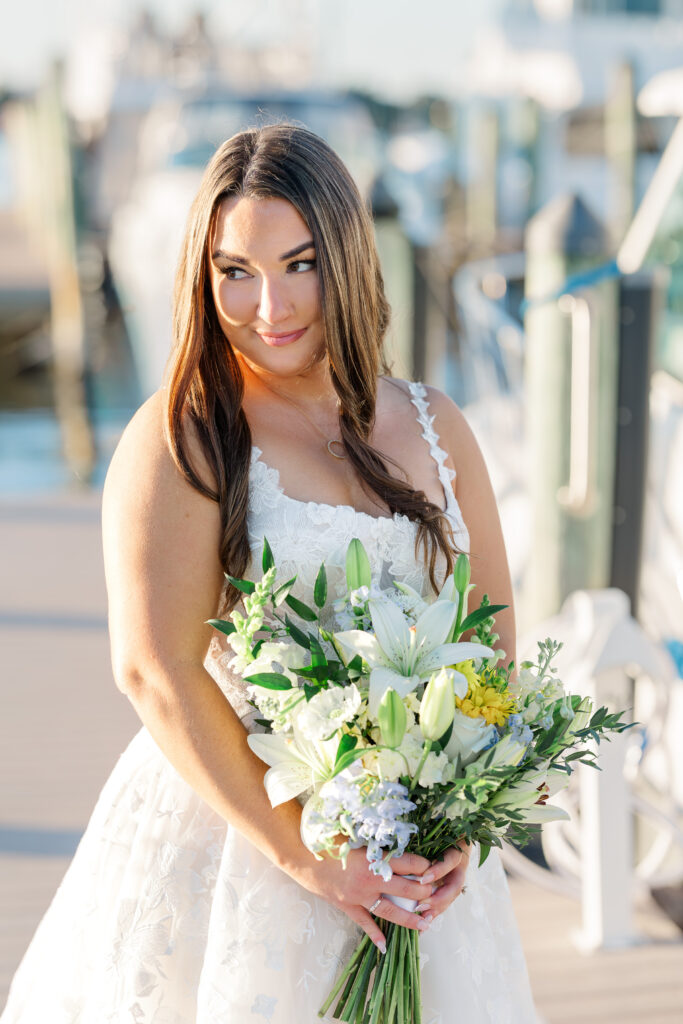 Blue and yellow wedding florals at Florida yacht club wedding