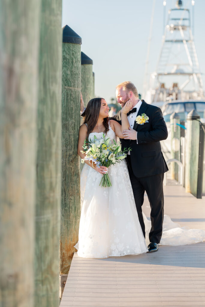 Bridal portraits at Eau Gallie Yacht Club waterfront Florida wedding