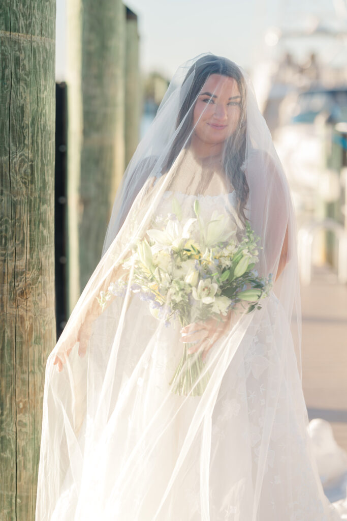 Blue and yellow wedding florals at Florida yacht club wedding