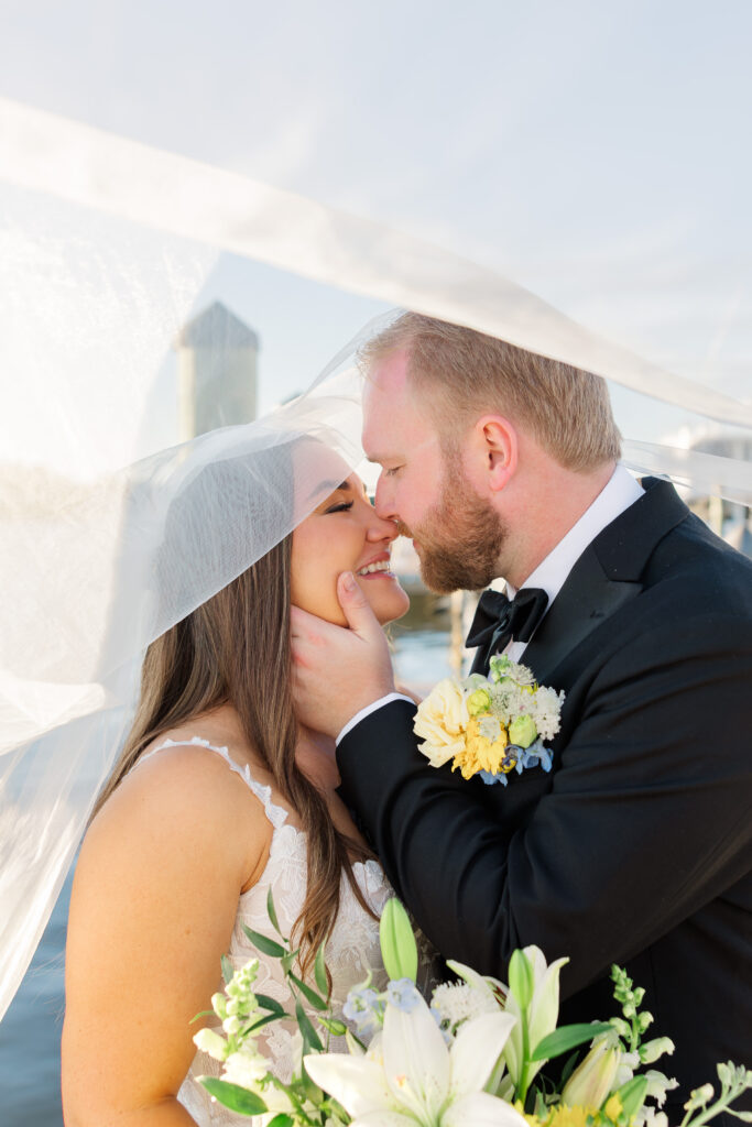 Bridal portraits at Eau Gallie Yacht Club waterfront Florida wedding