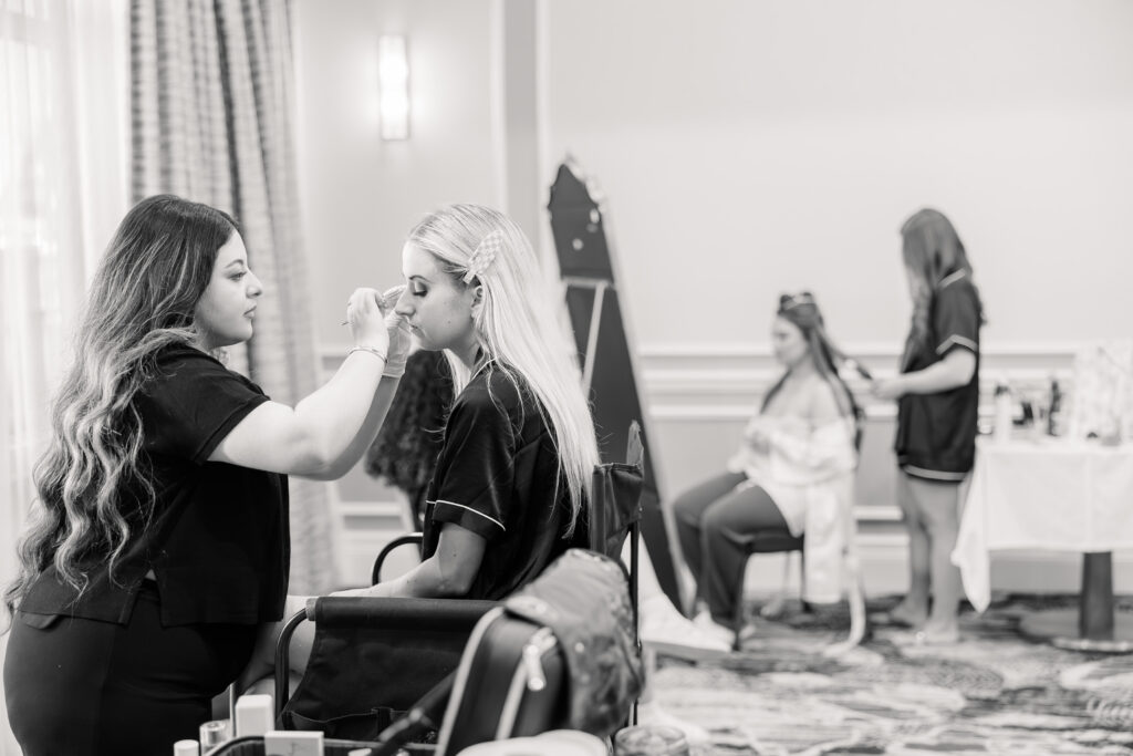 Bride getting ready with bridesmaids at Florida wedding yacht club