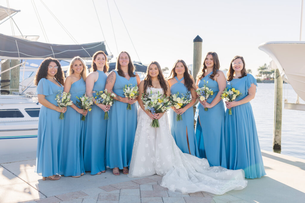 Blue and yellow wedding florals at Florida yacht club wedding