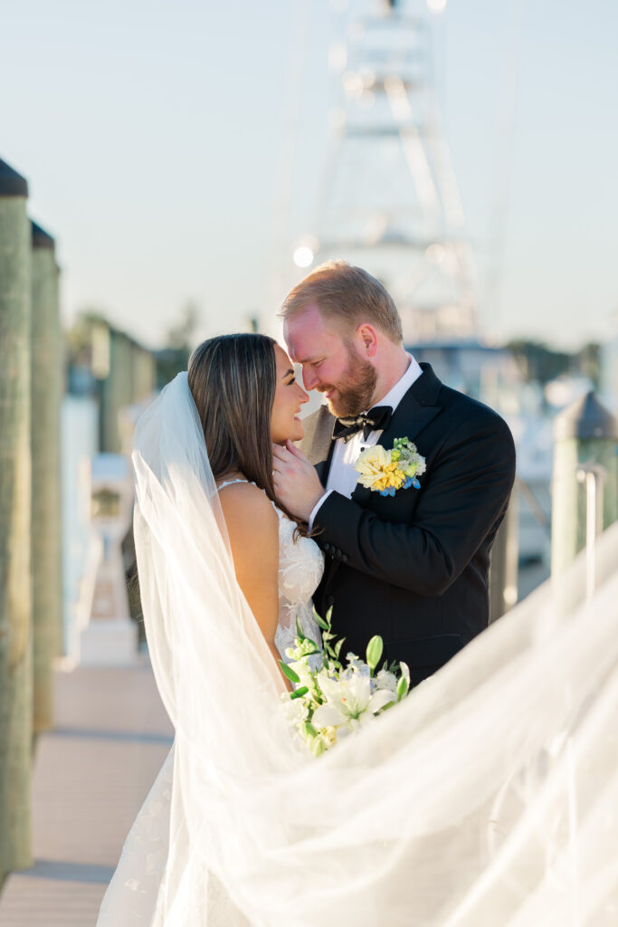Bridal portraits at Eau Gallie Yacht Club waterfront Florida wedding