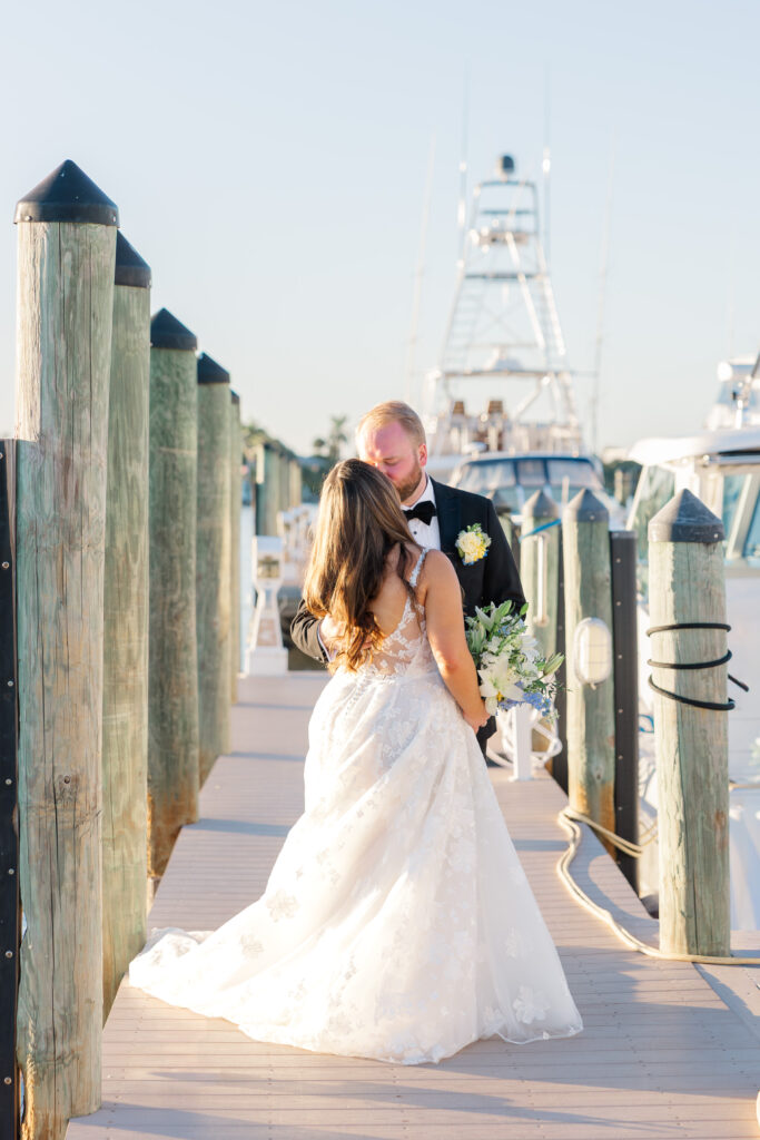 Bridal portraits at Eau Gallie Yacht Club waterfront Florida wedding