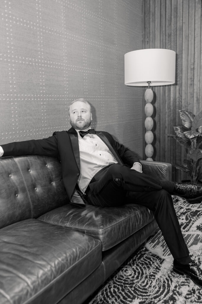 Groom getting ready with groomsmen at Eau Gallie Yacht Club Florida