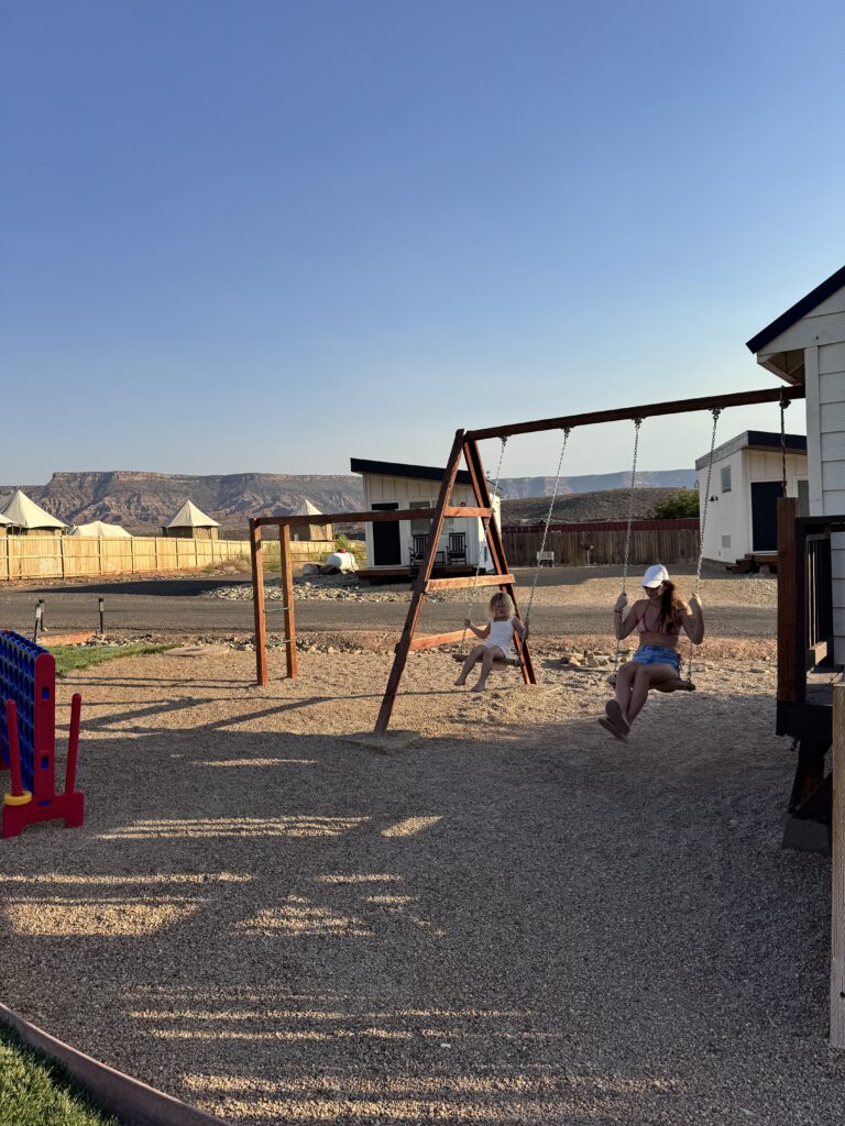 family using playground at zion wildflower resort