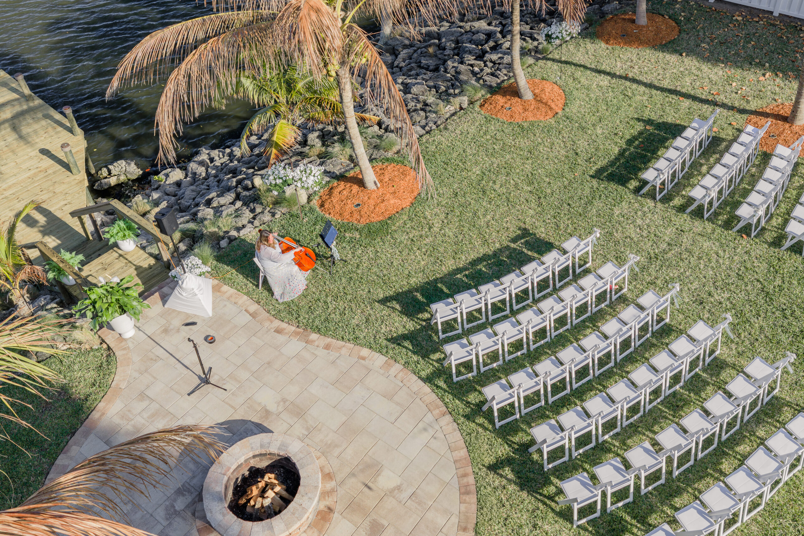 Drone view of reception and ceremony area in merritt island backyard wedding