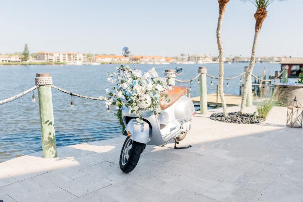Decorative scooter with florals representing couple’s travel story