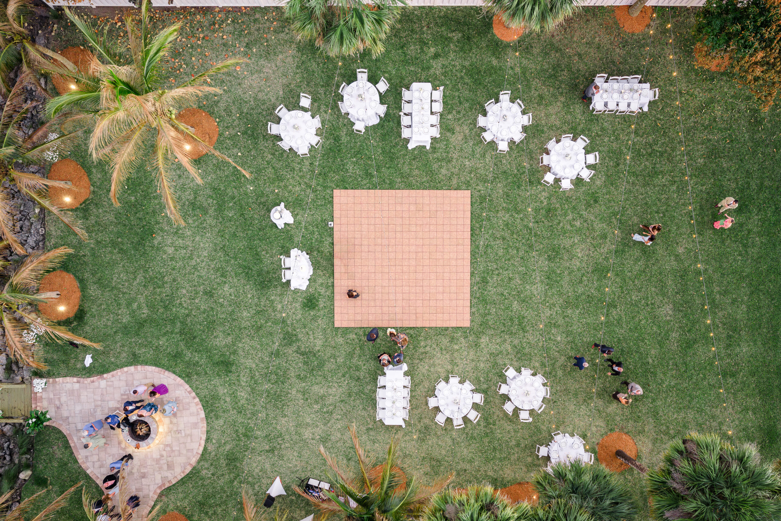 Drone view of reception and ceremony area in merritt island backyard wedding