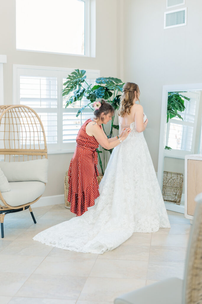 Bride and bridesmaids getting ready before Merritt Island Florida backyard wedding