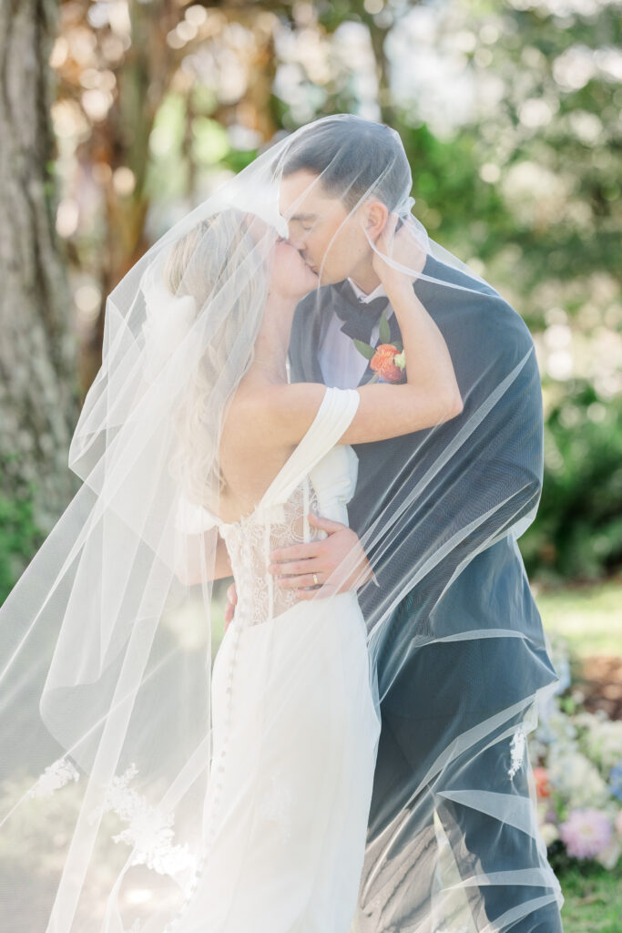 Bride and groom portraits at Victoria 1883 garden