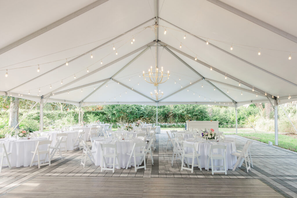 Outdoor Florida Wedding Reception under luxury tent.
