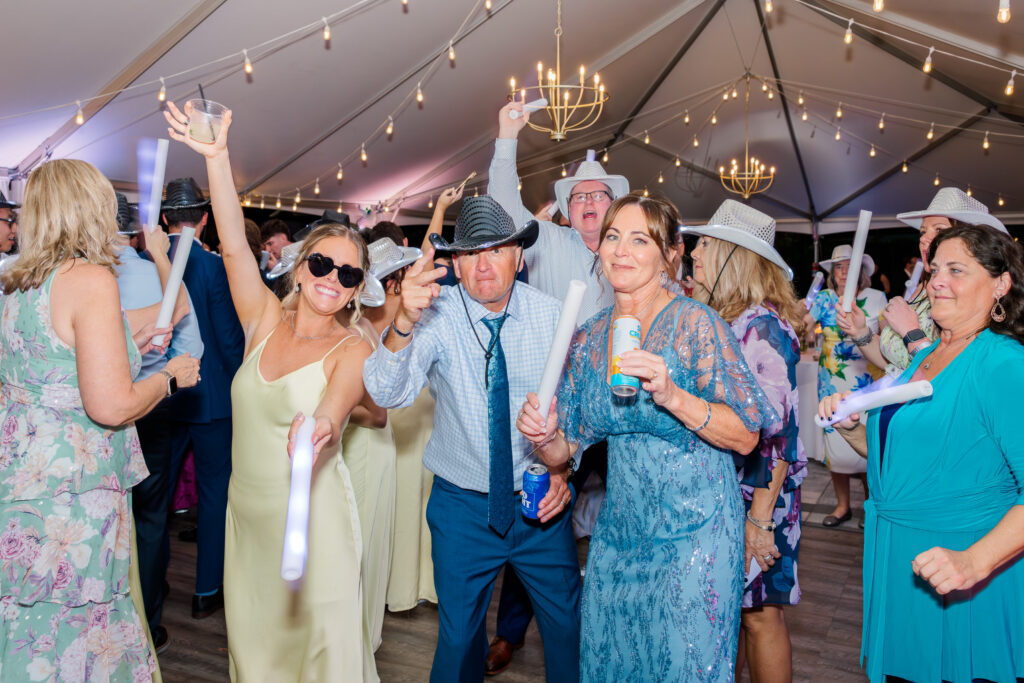 Wedding reception tent with dancing guests Florida wedding