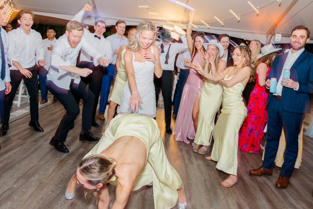 Wedding reception tent with dancing guests Florida wedding