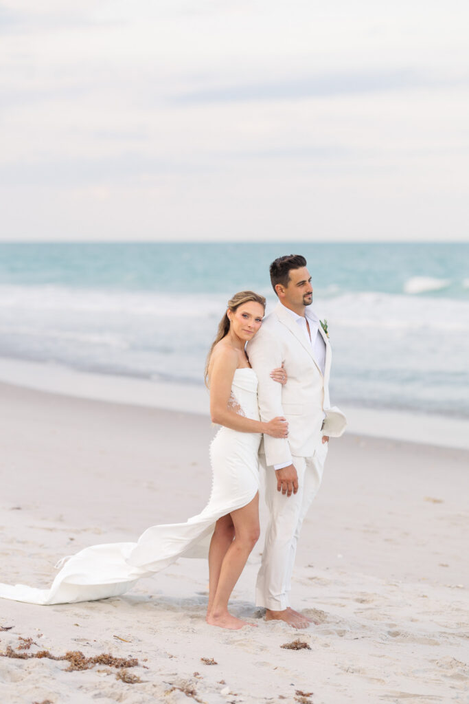 bride and groom on melbourne beach.